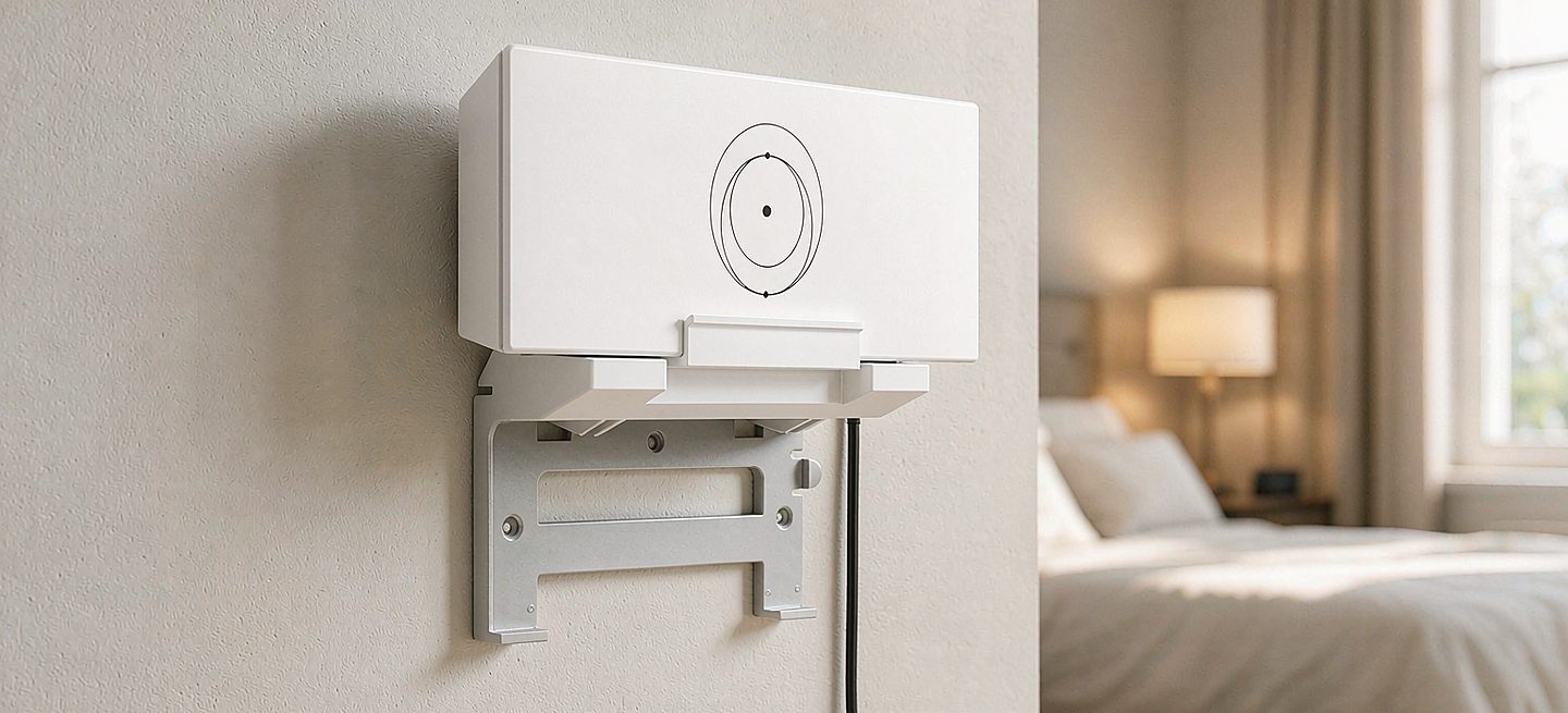A Starlink Gen 3 router fixed to a wall with its cables tidied away